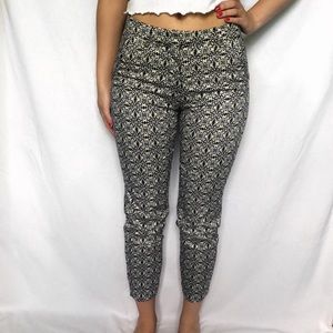 Black, blue, and white patterned cigarette pants